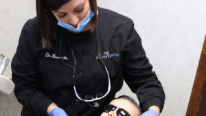 Dr. Hayley Beaudette with pediatric dental patient