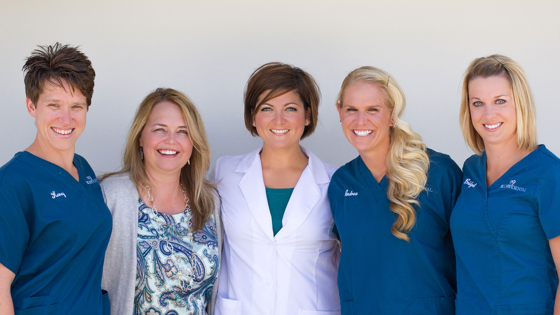 Bluffs Dental Team smiling together